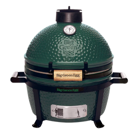 Green Big Green Egg grill on a white background